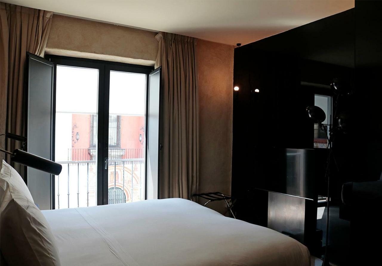 Eme Catedral Mercer Hotel Sevilla Exteriör bild A room at the hotel