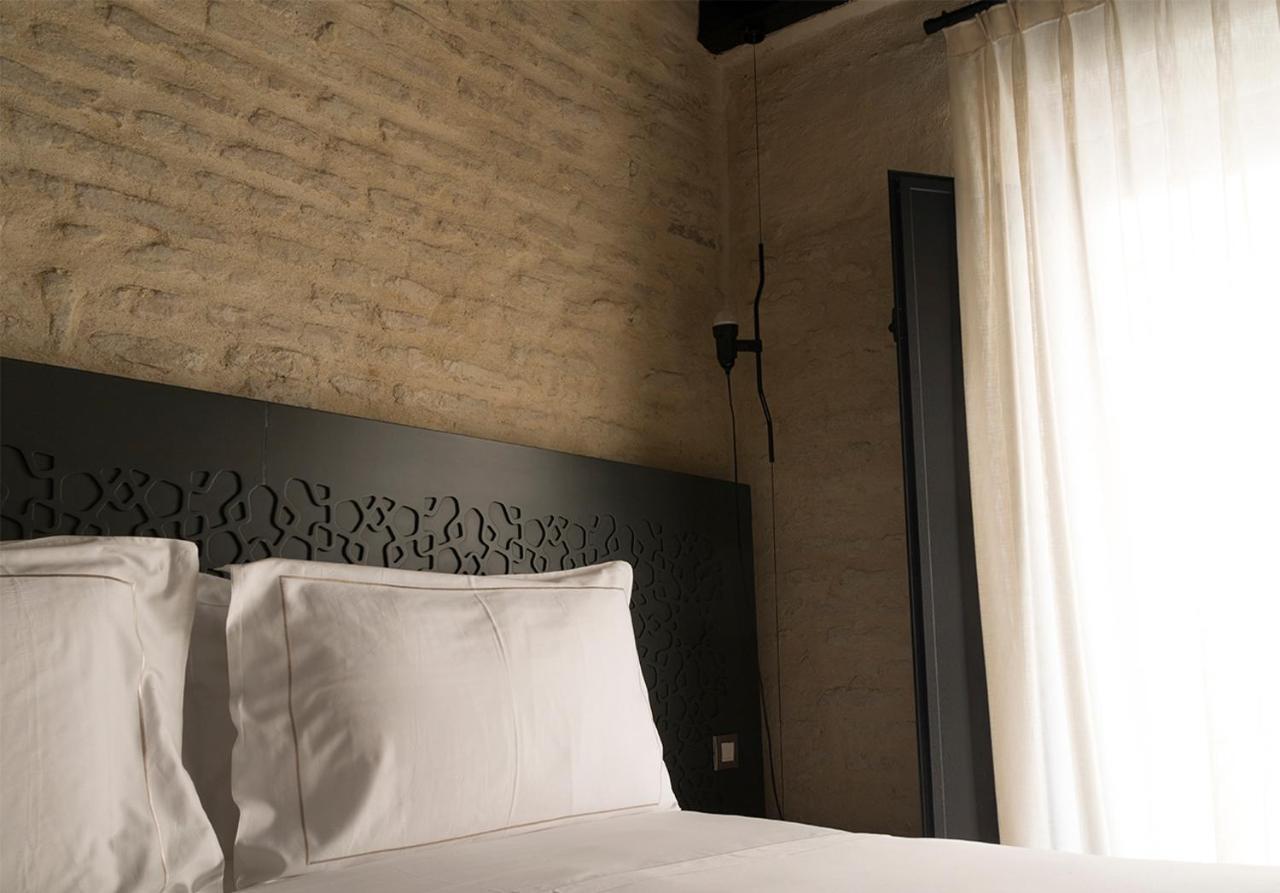 Eme Catedral Mercer Hotel Sevilla Exteriör bild A bedroom at the hotel